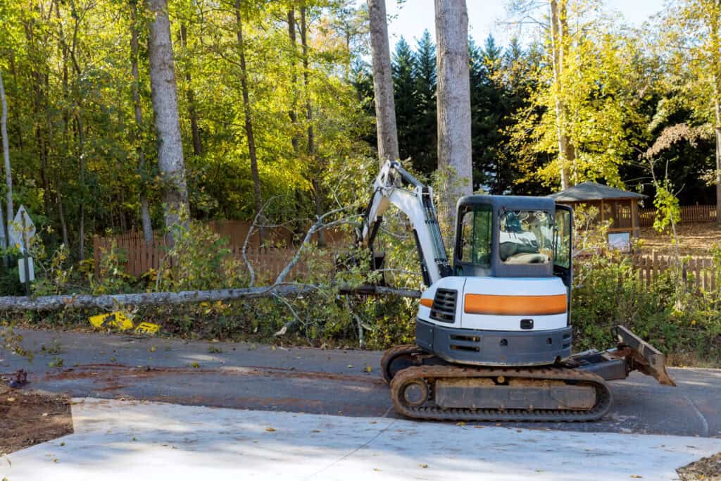 A Slidell Tree Service clearing tree debris