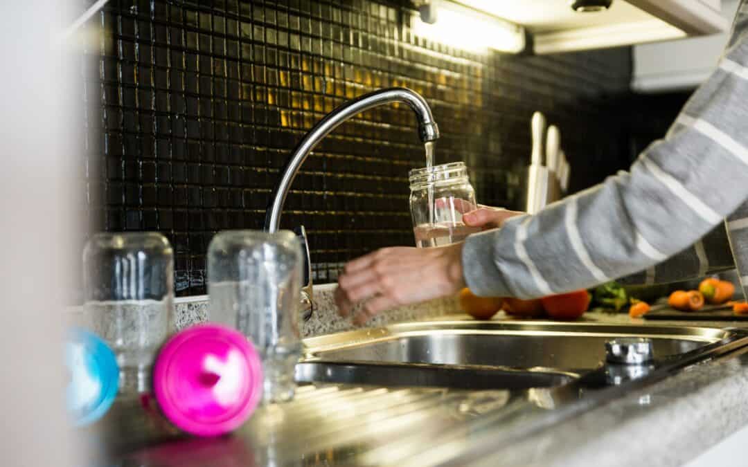 water coming from the kitchen faucet