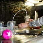 water coming from the kitchen faucet